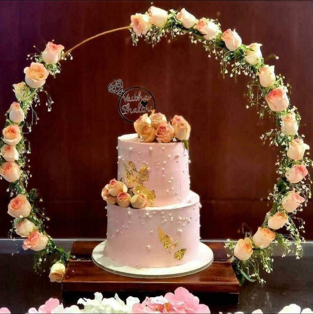 Wedding cake with floral arch